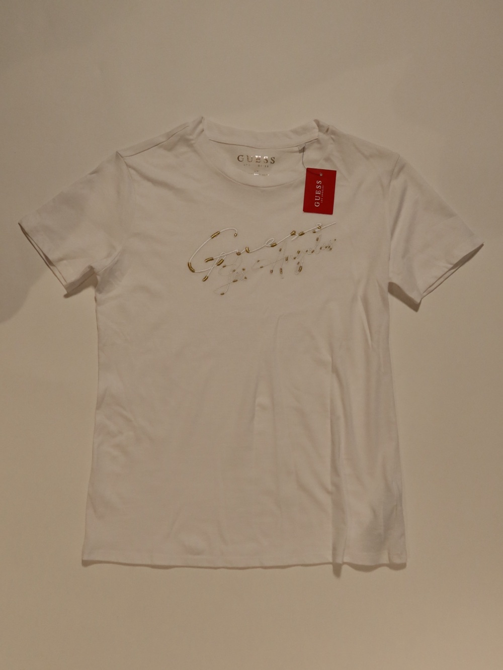 GUESS White Short Sleeve Tee with Gold Script Logo